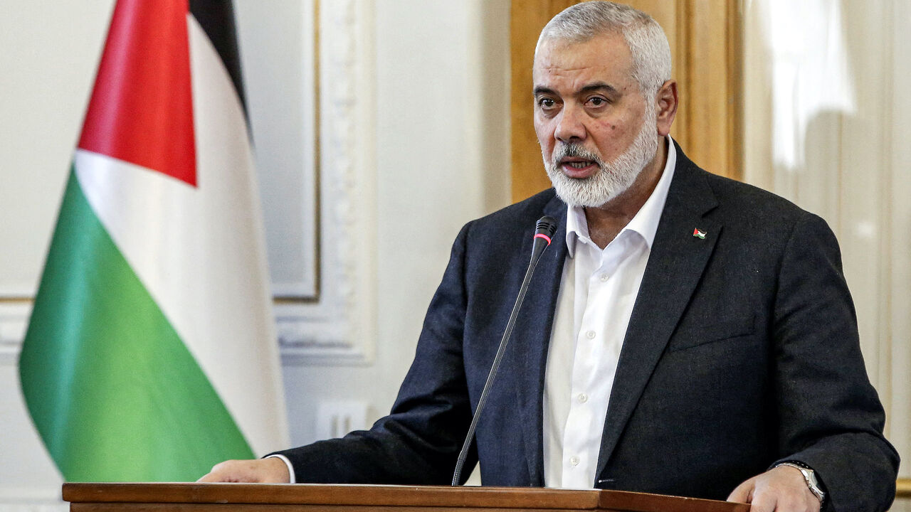 Ismail Haniyeh, the Doha-based political bureau chief of the Palestinian Islamist movement Hamas, speaks to the press after a meeting with the Iranian foreign minister in Tehran on March 26, 2024. Haniyeh's visit to Tehran comes a day after a resolution adopted by the UN Security Council called for an "immediate ceasefire" for the ongoing Muslim holy month of Ramadan, leading to a "lasting" truce. (Photo by AFP) (Photo by -/AFP via Getty Images)